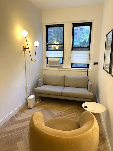 Comfortable office seating with couch and chairs present